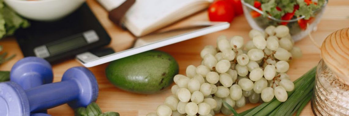 A vibrant composition of fruits, vegetables, and fitness items promoting a healthy lifestyle.